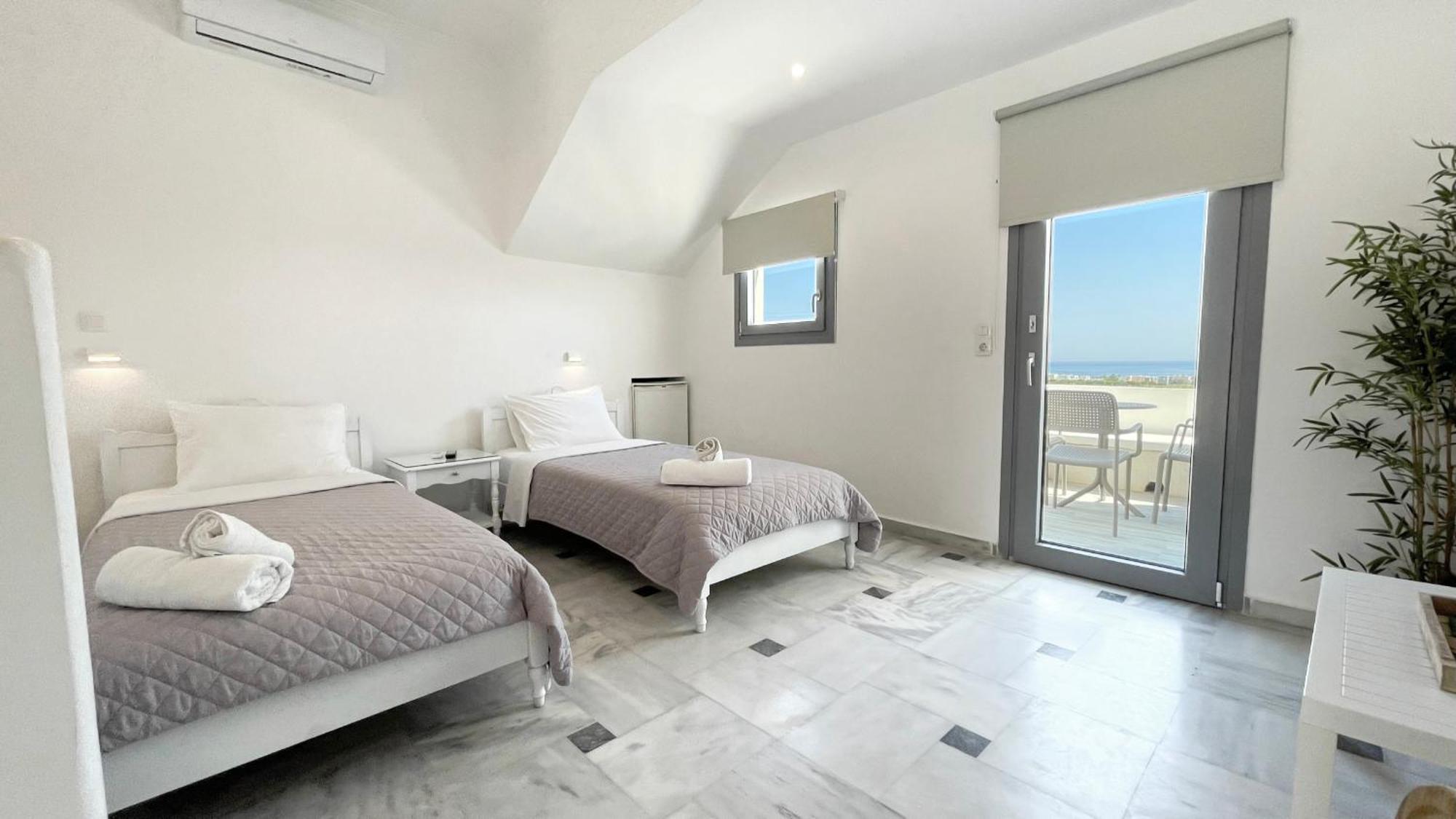 Hermoso Luxury Suites 모노리토스 객실 사진